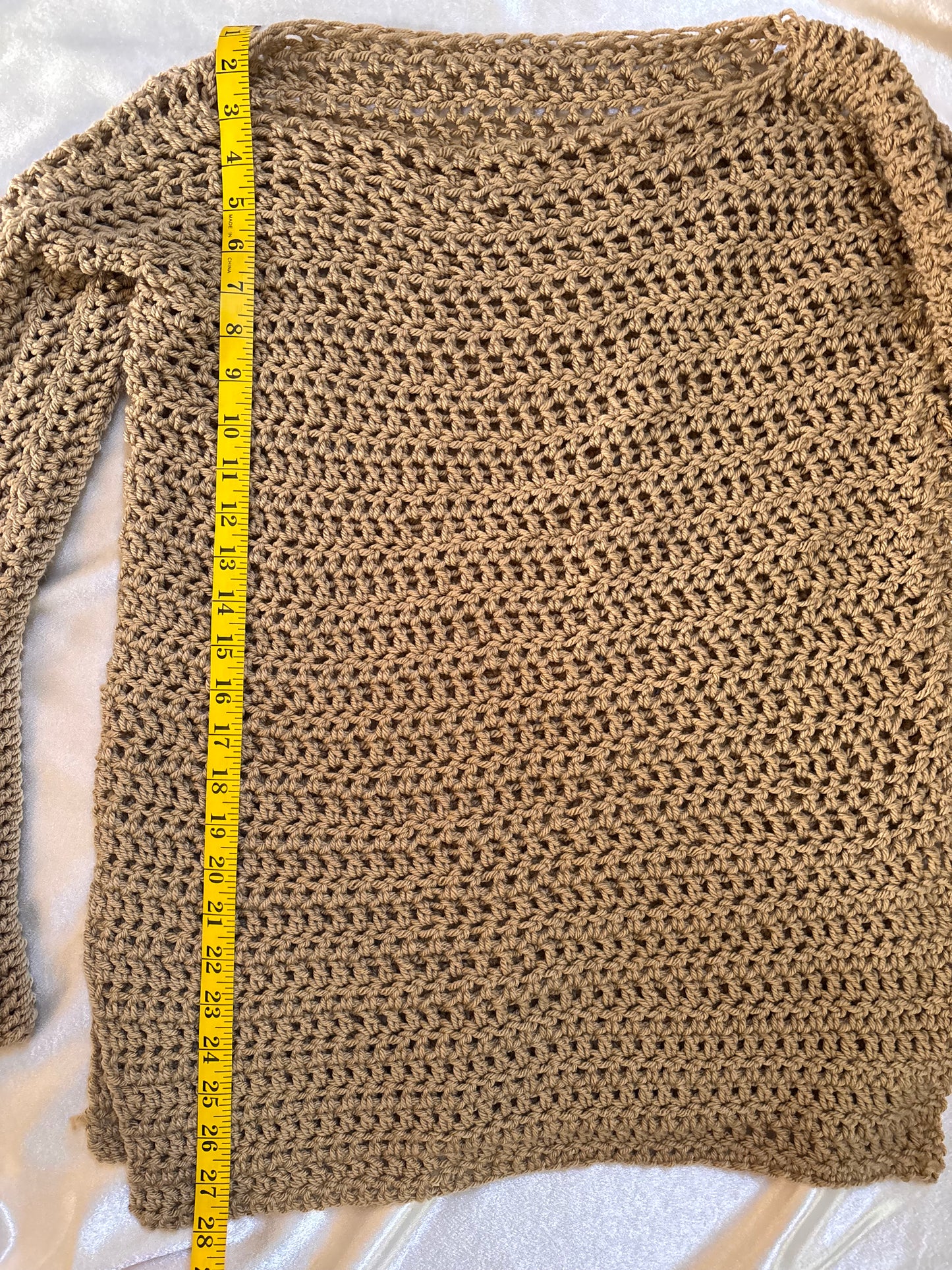 Keenan’s Brown Sweater