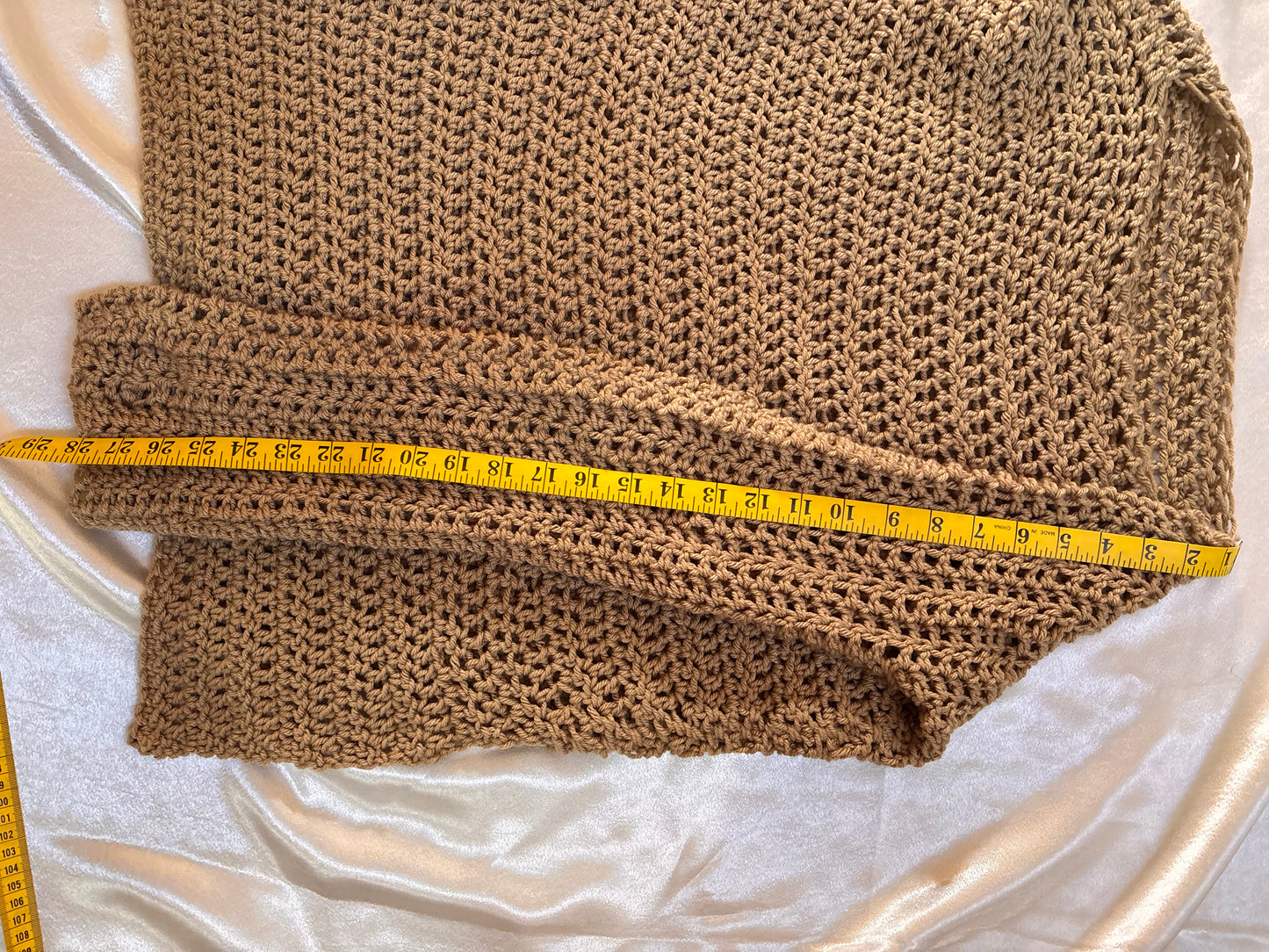 Keenan’s Brown Sweater